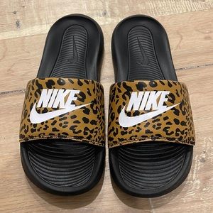 Women’s size 8 Nike leopard print slides